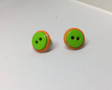 Green-on-orange button earrings